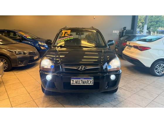 HYUNDAI TUCSON 2.0 MPFI GLS 16V 143CV 2WD GASOLINA 4P AUTOMÁTICO HYUNDAI TUCSON 2.0 MPFI GLS 16V 143CV 2WD GASOLINA 4P AUTOMÁTICO